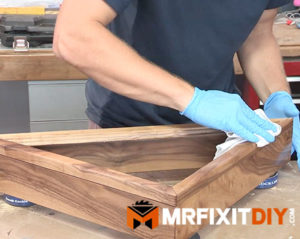applying tung oil finish memorial flag case