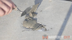 fixing a crack in concrete home prepped for winter