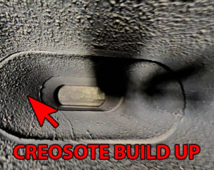 creosote build up in dirty chimney DIY chimney cleaning
