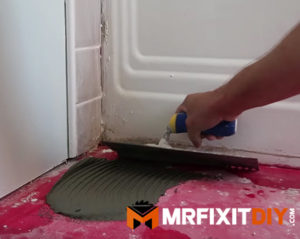 tile floor installation with a notched trowel